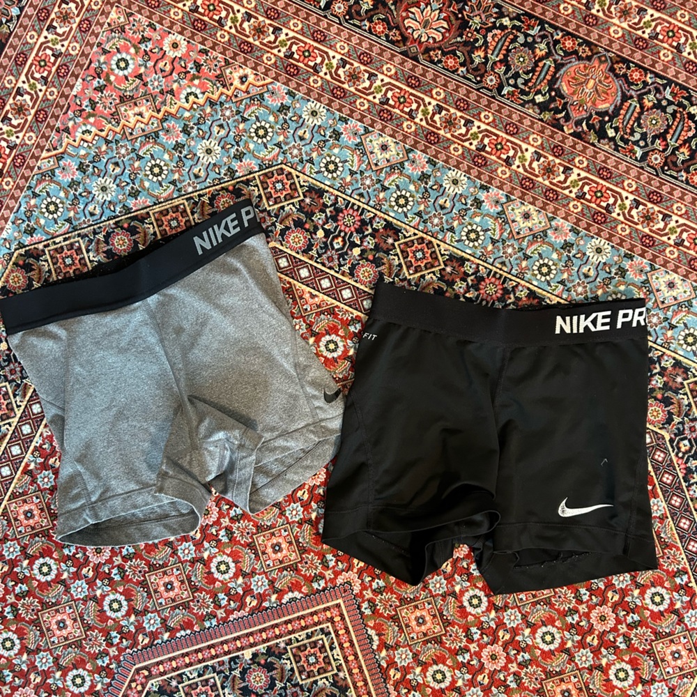 2 pairs of Nike Pro spandex